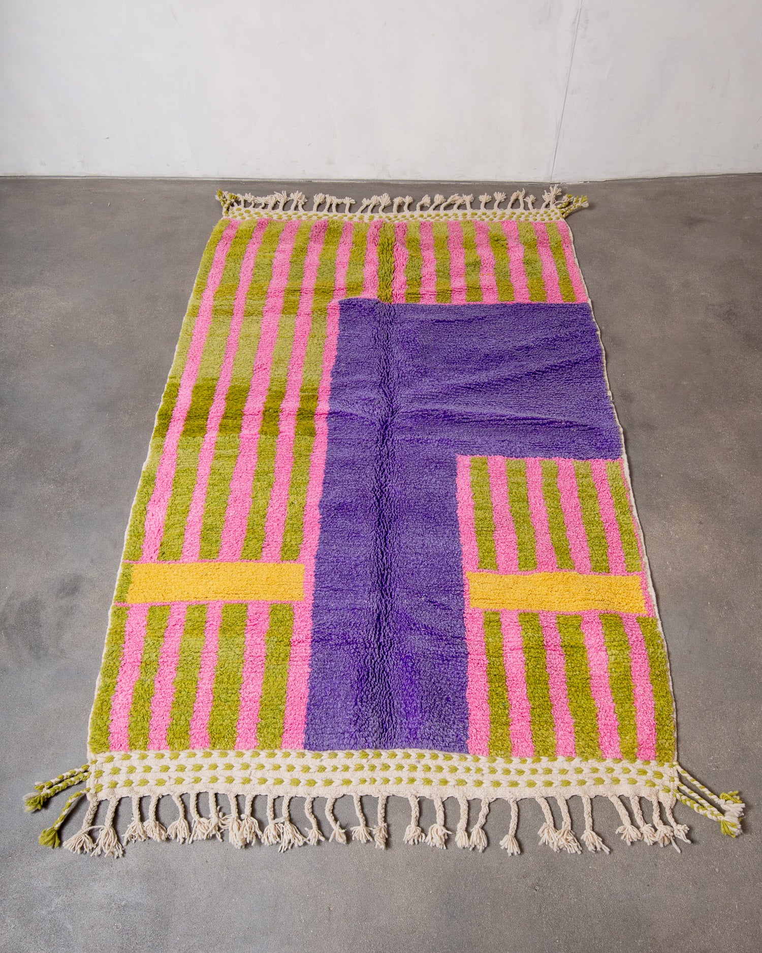Modern, designer, handcrafted Berber rug from Morocco. Beniourain carpet with beautiful colours and patterns and fluffy wool texture.